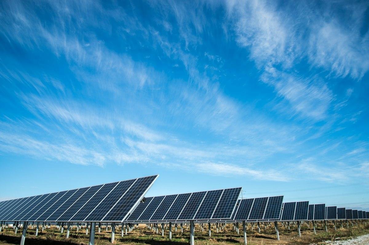 Solar farm under blue sky